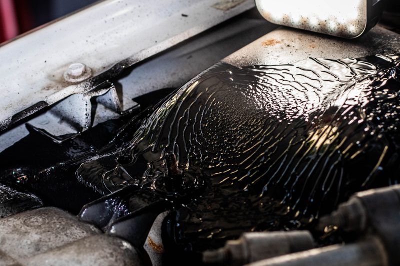 Engine oil sludge buildup from neglected maintenance