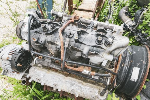 Heavily rusted, weathered engine and subframe — the kind of corrosion that ends a vehicle's life in Ontario