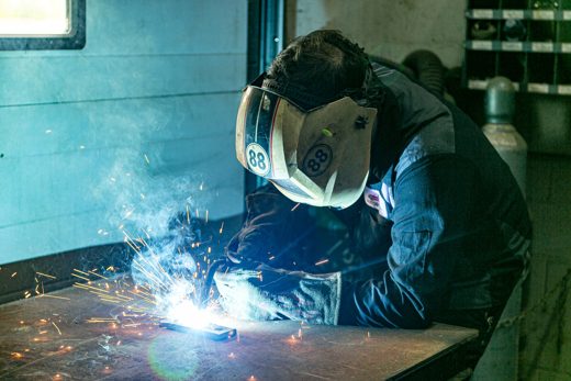 Welding with sparks in the service bay