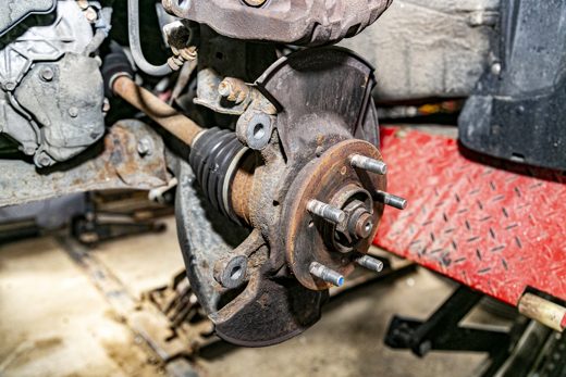 Wheel hub, suspension and CV axle close-up where clunks and pops originate